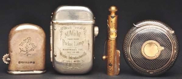 Lot of 4: Metal Trench Lighters.: Description Includes one marked "Magic Pocket Lamp" and dated "1889", one in the form of a pencil top marked "New Bachelor", one that is hallmarked, and one circular. Condition (Excellent). Size Large