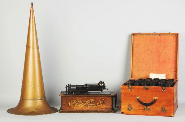 Edison Phonograph with Brass Horn.: Working. Includes a box of cylinders. Condition (Excellent). Size Horn: 36 - 1/2" L.