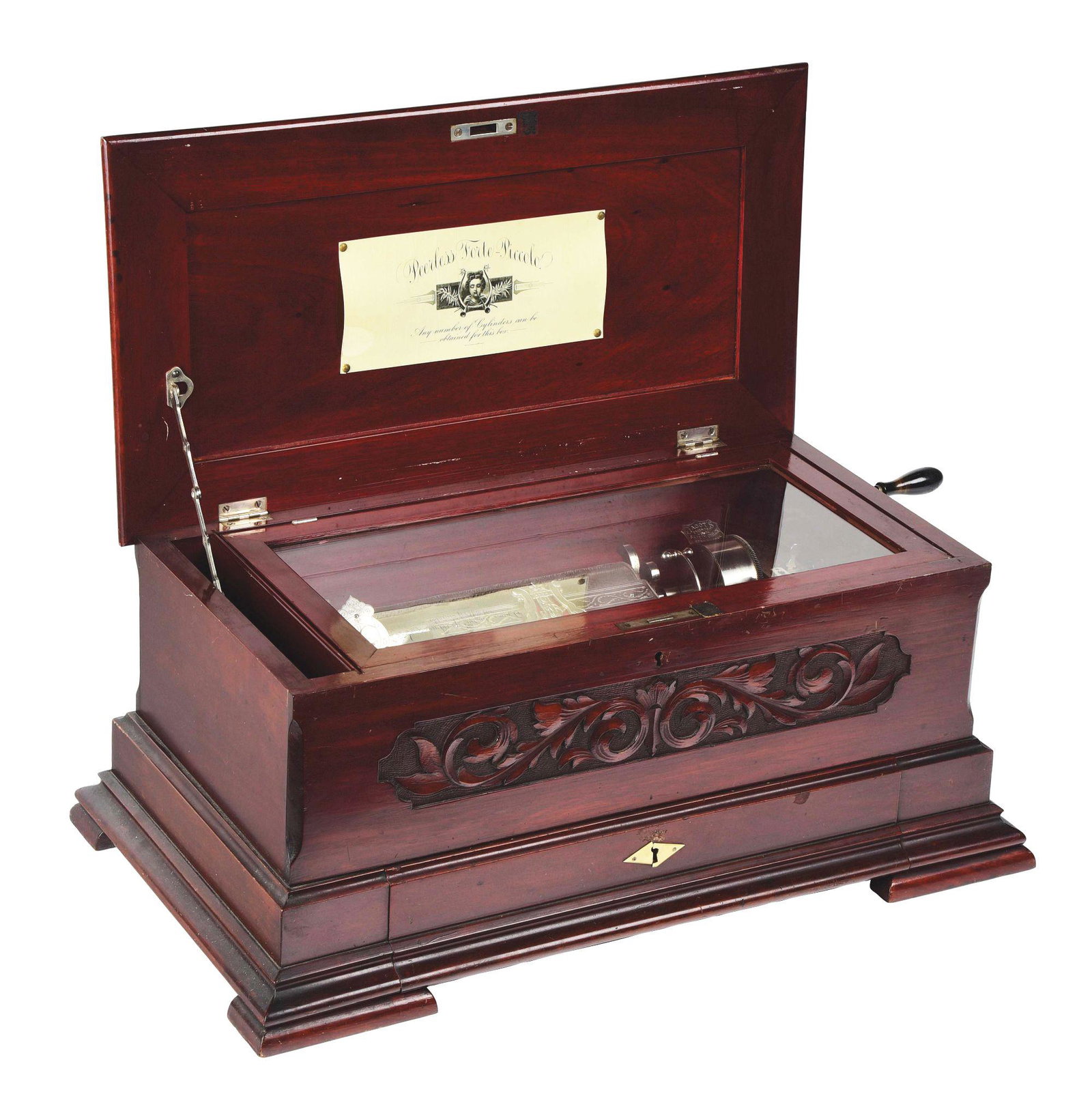 PEERLESS FORTE-PICCOLOO MAHOGANY CYLINDER MUSIC BOX.: A wonderful "Fabrique De Geneve" Peerless Forte Piccolo music box in a crafted mahogany cabinet. Serial 32833, playing a 9" by 2 - 1/4" cylinder. Comes with original tune card showing six tunes, marke