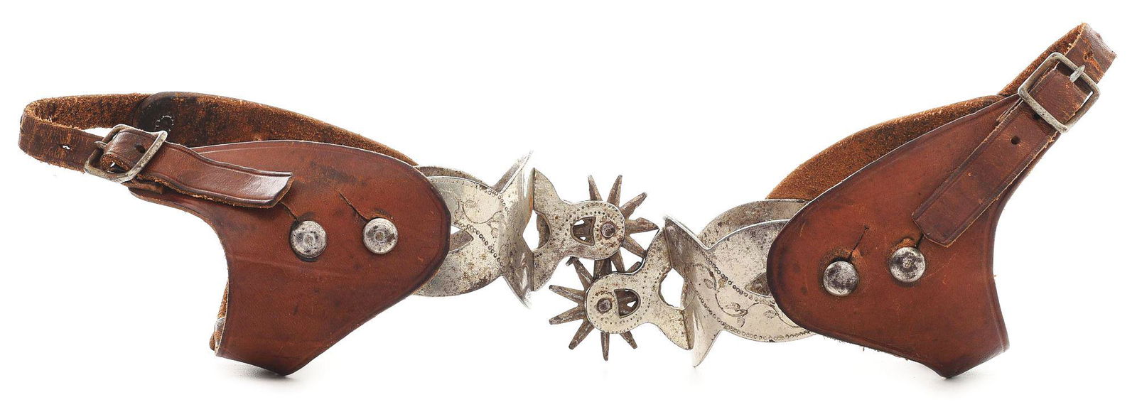 AUGUST BUERMANN "EXCELSIOR" SPURS: A part of Buermann's "Patent Steel Cowboy Spur" line, the pattern 1209 is unique in style. The bands are 2" wide with a stubby 1 - 1/4" shank. These have the original nickel finish with about 90% rema