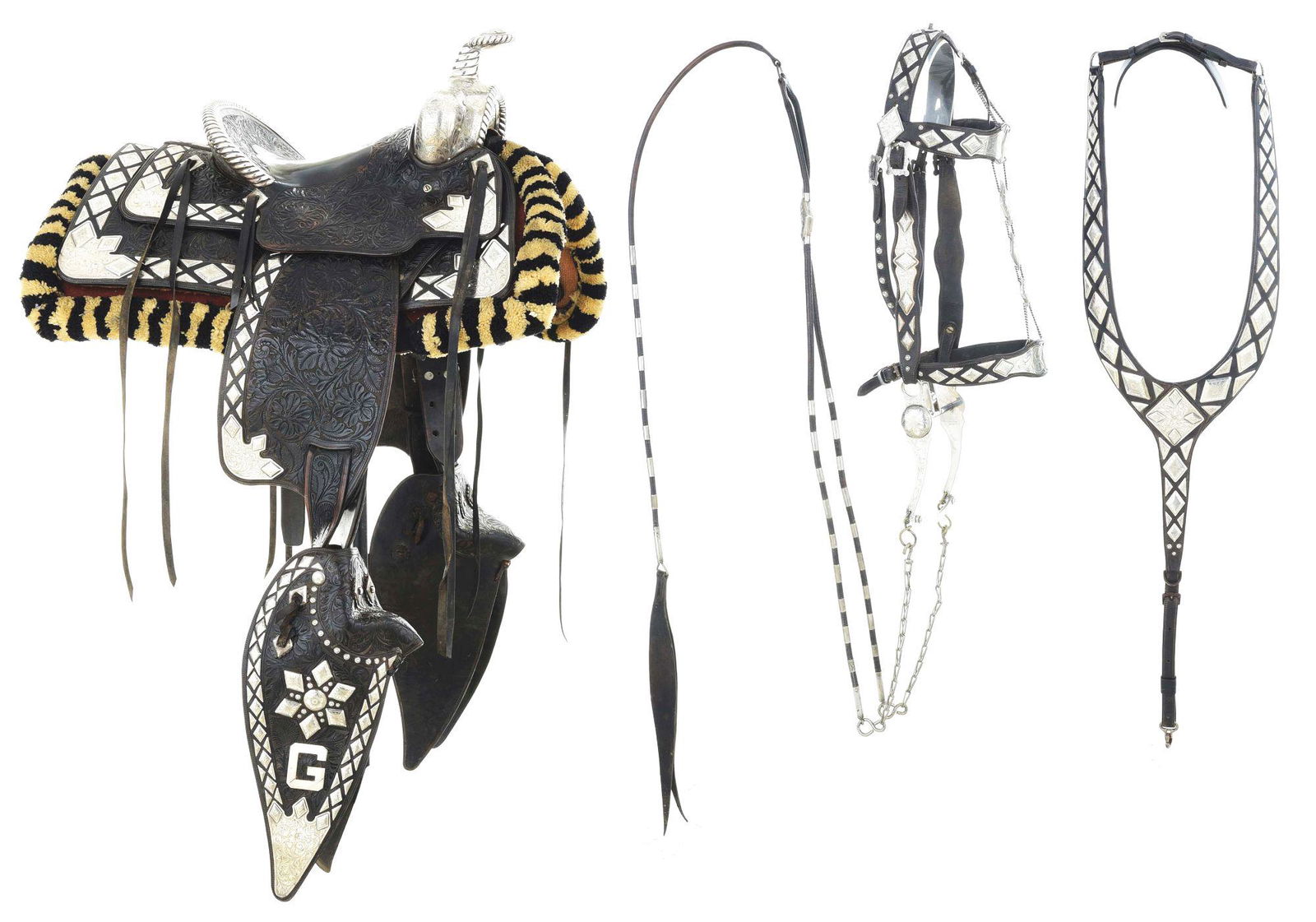 EDWARD H. BOHLIN PARADE SADDLE: Classic black, fully floral carved Edward H. Bohlin, Hollywood, Calif "Dick Dickson, Jr" parade saddle with 100% matching Bohlinmade Bridle, Bit and Martingale. The Dickson Jr was one of the most popu