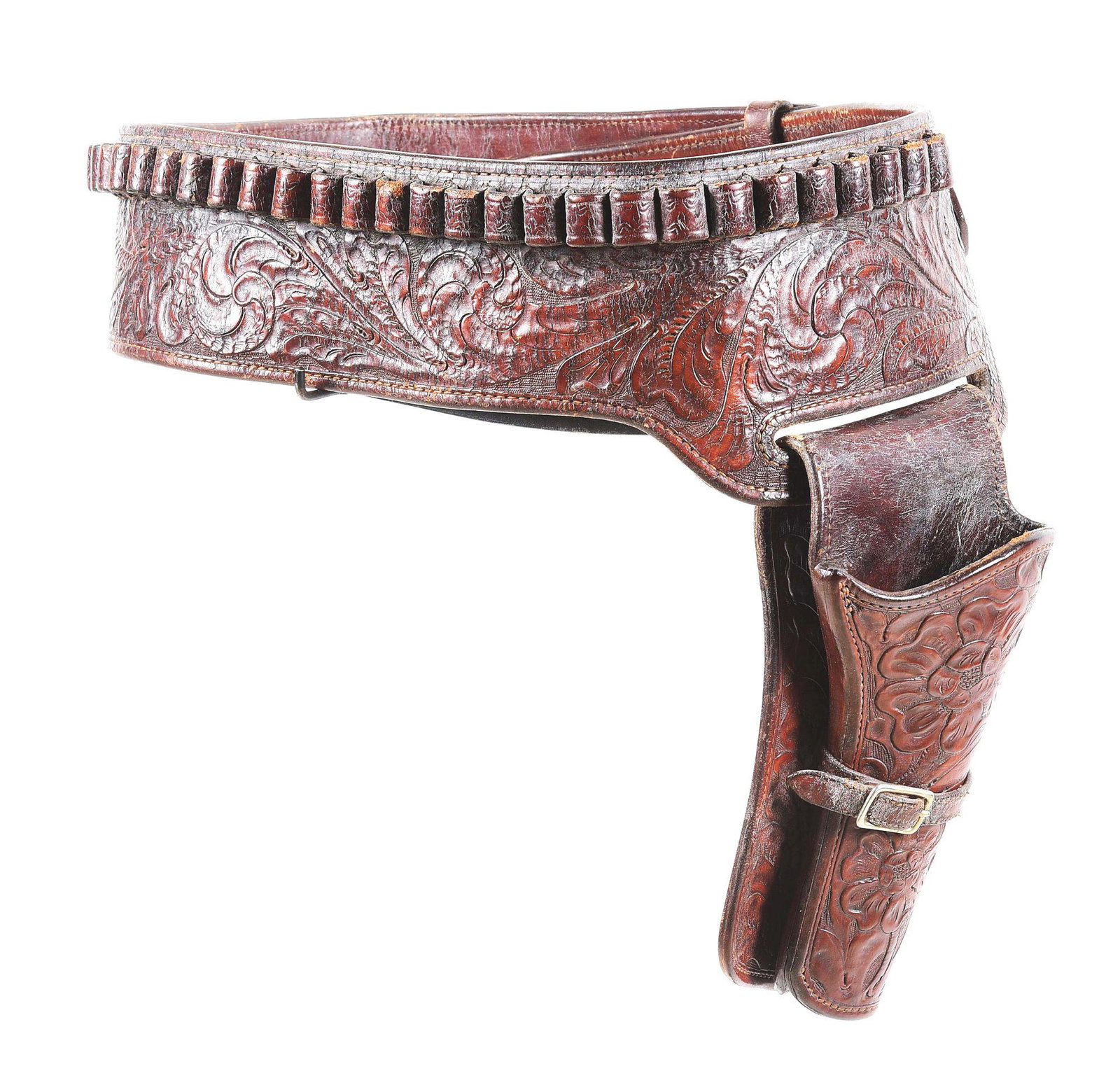 EDWARD H. BOHLIN GUN BELT & HOLSTER RIG: A flower tooled buscadero rig by Edward Bohlin with the early small Hollywood mark on the holster and the correct large shield mark inside the 3 - 3/4" cartridge belt. The holster is made for a 5 - 1/