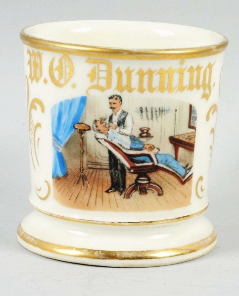 Dentist Shaving Mug.: Gilt name "W.D. Dunning". Detailed image of dentist working on patient. Condition (Near Mint). Size 3 - 1/2" T.