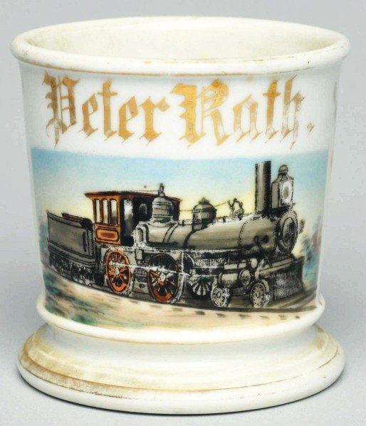Locomotive Shaving Mug.: Gilt name "Peter Rath". Nice image of engine and tender. "T&V Limoges France" mark on bottom. Condition (Excellent). Size 3 - 1/2" T.