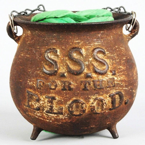 S.S.S. Cast Iron String Holder.: Exact age is unknown. A few remnants of old paint remains. Surface rust overall. Condition (Very Good Plus). Size 4 - 1/2" T.