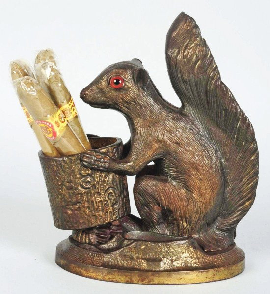 Large Figural Squirrel Cigar & Match Holder.: With fantastic detail and glass eyes. Condition (Excellent). Size 7 - 1/2" T.