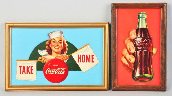 Lot of 2: Cardboard Coca-Cola Cutouts.: 1952. Both are framed under glass. Includes one sailor girl and one hand with bottle. Both were designed to go into battery-operated carton inserts for display. Just a few shallow surface bends and li