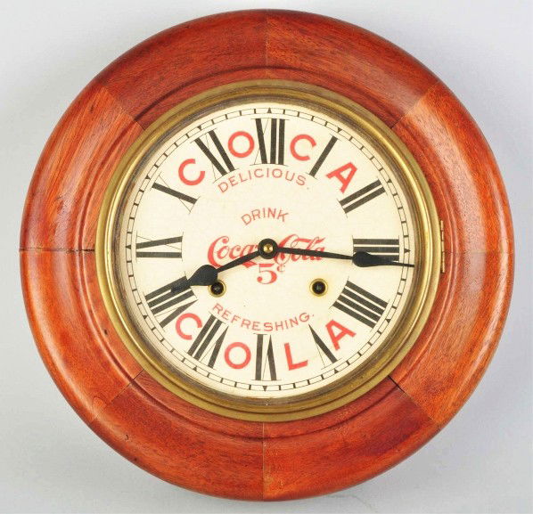 Coca-Cola Gallery Clock.: Clock is circa 1910 to 1920 and the face is circa 1970 to 1980. Nice display piece with good overall appearance and only light to moderate wear. Condition (Very Good - Excellent). Size 15 - 1/2" Dia.