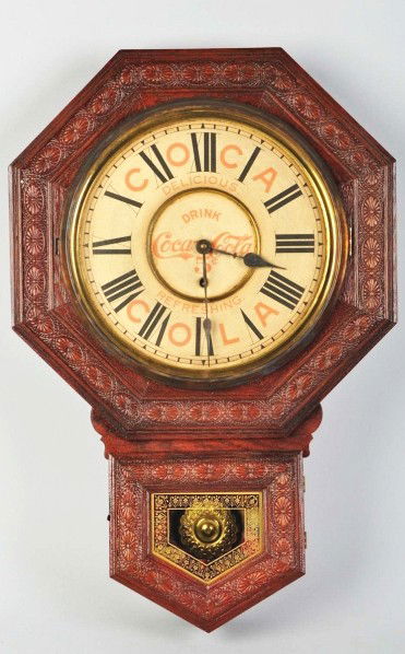 Coca-Cola Welch Octagonal Clock.: 1901. Sign on bottom is a reproduction; otherwise, the clock is strong in appearance with a refreshed old finish and only modest fading. Condition (Very Good Plus). Size 26 - 1/2" T.