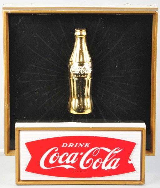 Coca-Cola Starburst Light-Up with Bottle.: 1960s. The face, side, and top of the sign are all plastic with scattered rubs, scratches, and two closed cracks on the corners. Displays nicely. Condition (Good - Very Good). Size 16 - 1/2" T.