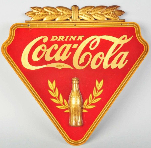 Plywood Coca-Cola Sign.: 1930s. Made by Kay Displays. This example has darkening, surface rust to bottle, and overall restoration to 50% of the lettering in the Coca-Cola logo. Some staining and color shade differences in red