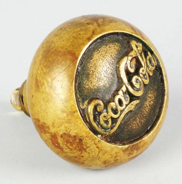 Early Brass Coca-Cola Doorknob.: Some medium to heavy overall soiling with moderate to average overall wear. Condition (Very Good). Size 2 - 1/4" Dia.