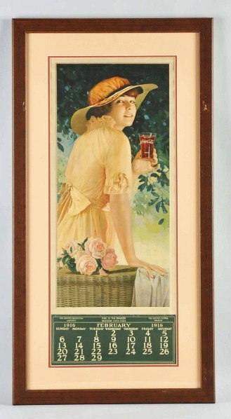 1916 Coca-Cola Calendar.: Nicely framed and matted under plexiglass. Retains original metal strip at top with a single February calendar page. One or two small closed tears near border areas and some medium to heavier roll mar