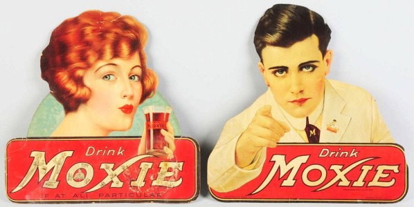 Lot of 2: Moxie Cardboard Cutouts.: Circa 1920s. Both are double-sided. Some edge wear, bends, small closed tears, surface spots and stains. Frank Archer, himself, has light wear, chips, nicks, and some stains. Condition (Good - Very Go