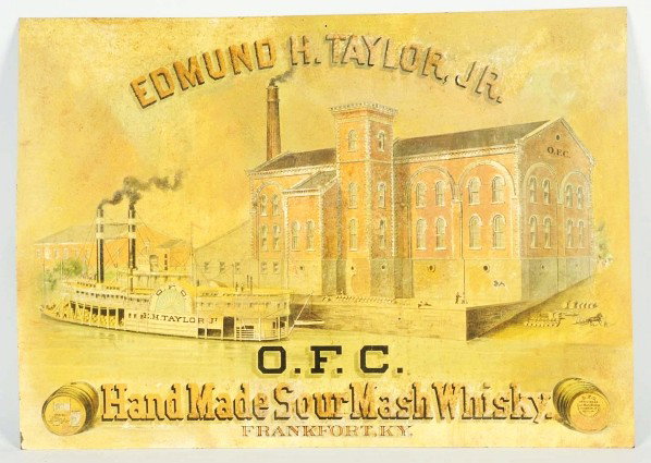 Tin O.F.C. Sour Marsh Whiskey Sign.: Frankfort, KY. Beautiful, early sign with paddle boat outside the O.F.C. Factory. Overall wear and fading. Condition (Very Good). Size 19 - 3/4" x 27 - 1/2".