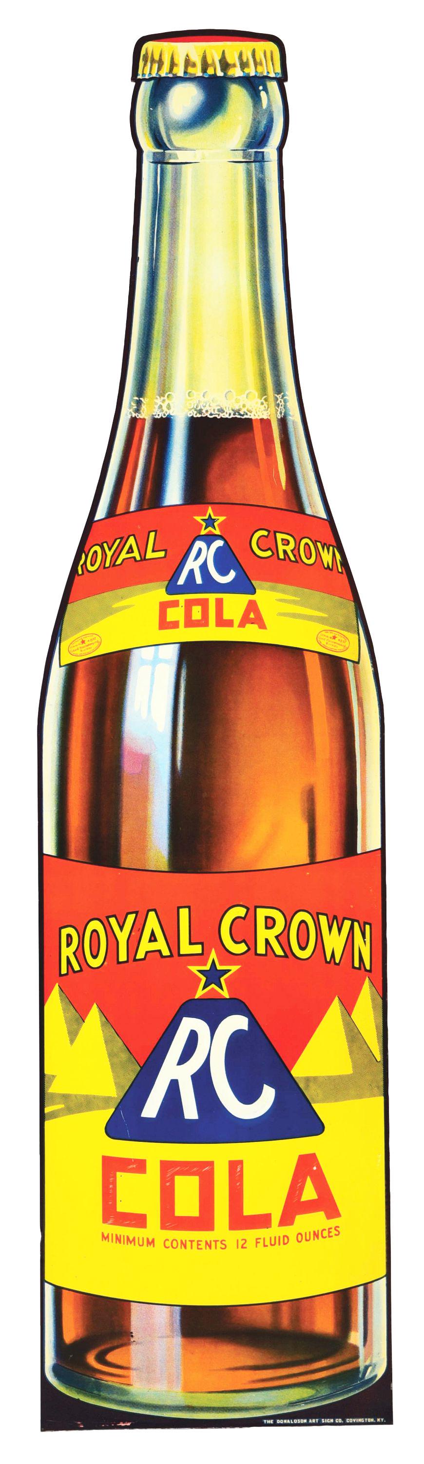 R.C. COLA EMBOSSED TIN BOTTLE SIGN W/ PYRAMID GRAPHIC.: SST. Sign is Maker Marked Donaldson Art Sign Company, Covington, Kentucky. An outstanding and colorful Embossed Tin Sign for R.C. Cola showing and excellent detailed bottle graphic. CONDITION: Sign is
