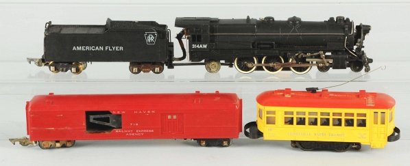 Lot of 4: American Flyer & Lionel Train Items.: American. Includes American Flyer s-gauge no. 314AW engine with matching American Flyer tender and one New Haven no. 718 Railway Express car. Also includes no. 60 Lionel Rapid Transit Trolley with ori