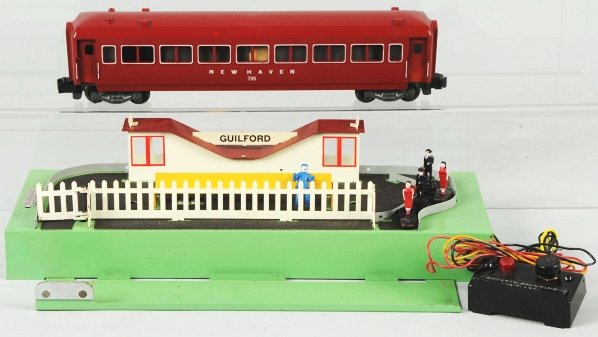 American Flyer Animated Station Platform & Car.: American. S-gauge. Includes no. 735 New Haven car with platform marked "Guilford". Box has some creasing throughout. Condition (Near Mint).