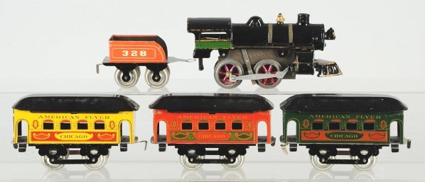 American Flyer Emond-Metzel Passenger Train Set.: American. Includes one clockwork engine, no. 328 tender, and three Chicago passenger cars in yellow, green, and red. This train set has very little wear overall. Includes original set box marked "5605