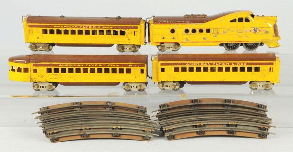 American Flyer Union Pacific Passenger Train Set.: American. Pre-war. O-gauge. Includes engine and three passenger cars. All with moderate to heavy paint chipping and wear. Condition (Good).