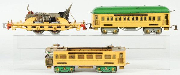 Lot of 3: American Flyer Pocahontas Pieces.: American. Pre-war. Standard gauge. Includes no. 4341 pullman car, no. 4342 observation car (missing roof), and the frame and motor of an engine (missing cab). Some scratching and wear to roof of pullm