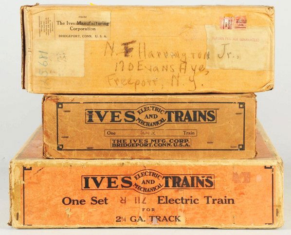 Lot of 3: Ives Train Boxes.: American. Pre-war. Includes two set boxes, one for O-gauge and one for standard gauge, and one individual box. Some tearing and creasing throughout. Boxes only. Condition (Very Good).