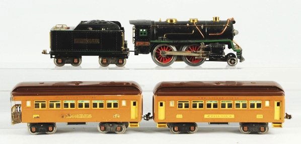 Lionel Standard Gauge No. 384 Passenger Train Set: American. Includes no. 384 steam engine with matching Lionel Lines tender with green stripe. Also includes two passenger cars in Baby State brown consisting of no. 309 pullman and no. 312 observation