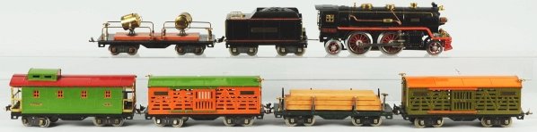 Lionel Standard Gauge No. 390 Freight Train Set.: American. Pre-war. Includes no. 390E engine with matching Lionel Lines orange-striped no. 390T tender. Also includes five 500 series freight cars consisting of no. 520 searchlight, two no. 513 cattle 