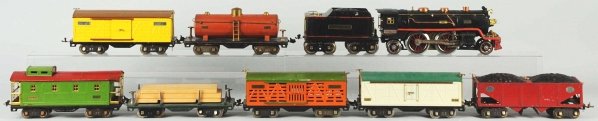Lionel Standard Gauge No. 390 Freight Train Set.: American. Pre-war. Includes no. 390E steam engine and matching no. 390T Lionel Lines tender with orange striping. Unusual that the tender comes with 200 series trucks. Also includes seven 500 series f