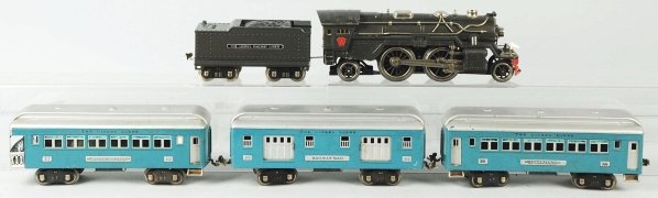Lionel Standard Gauge No. 385 Passenger Train Set: American. Includes no. 385E steam type locomotive with matching Lionel Lines tender. Engine has some scratching throughout cab, especially to roof, and tender has been restored. Also includes three pa