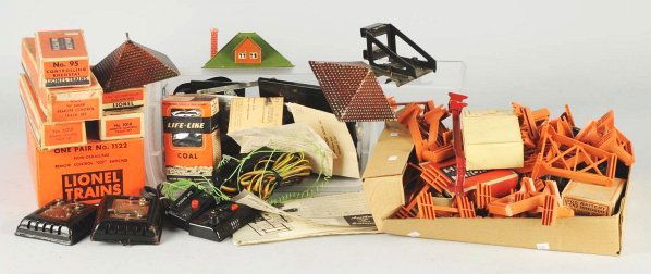 Lot of Lionel Railroad Accessories.: American. Post-war. Includes wheels, controllers, trestle pieces, and other items. Various conditions. Condition (Very Good).