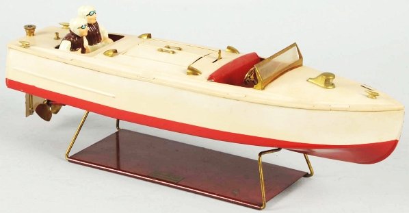 Lionel No. 44 Clockwork Motor Boat.: American. Marked "Lionel Craft" on back with original stand and replaced metal drivers. Boat is complete with just some minor wear and scratching to base of stand. Condition (Very Good - Excellent).
