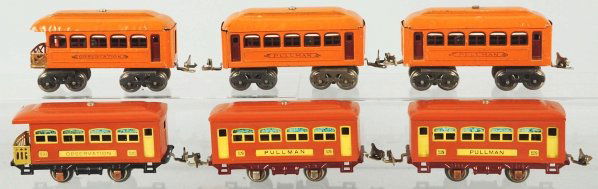 Lot of 6: Lionel O-Gauge Passenger Train Cars.: American. Pre-war. Includes two no. 529 pullman cars and no. 530 observation car, all in terracotta. Also includes two no. 603 pullman cars and no. 604 observation car. Includes two original boxes for