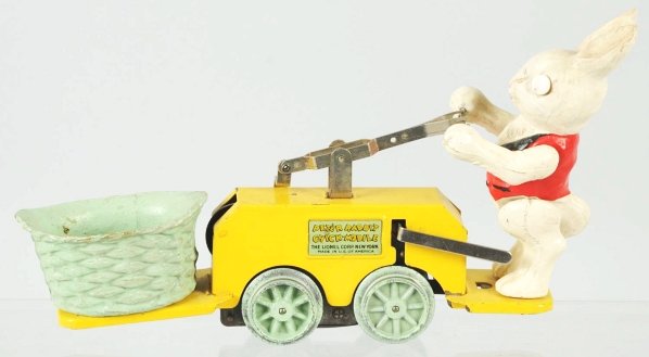 Lionel Peter Rabbit Chick Mobile Handcar.: American. Clockwork mechanism is working. Rabbit has new eyes and the red vest has been restored. Some slight cracking in basket and some paint loss and wear overall. Condition (Very Good).