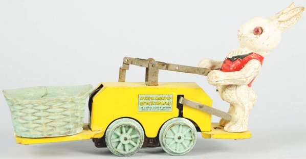 Lionel Peter Rabbit Clockwork Chickmobile Handcar: American. Rabbit has original eyes. Some cracking to basket and some scratching and paint loss to top edge of base. Also, one chip out of the front of the basket. Condition (Very Good). Size 9 - 1/4" 