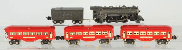Lionel No. 1666 Passenger Train Set.: American. Post-war. Includes no. 1666 locomotive with no. 2689W whistle tender, two no. 600 pullman cars, and one no. 601 observation car in red with cream window inserts. Minor scratching and wear ov