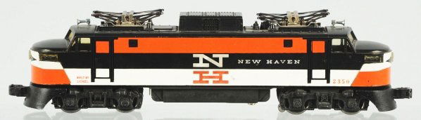 Lionel O-Gauge No. 2350 New Haven Train Engine.: American. Post-war. Original pantographs and clean battery case. Some slight peeling to decals in front and minor chipping throughout. Condition (Very Good - Excellent).