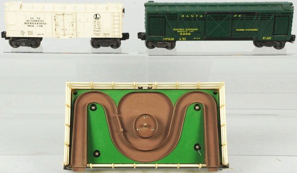 Lot of 2: Lionel Train Cars.: American. Post-war. Includes no. 3472 milk car with original box and no. 3356 horse car with horses, platform, and original box. Condition (Very Good).