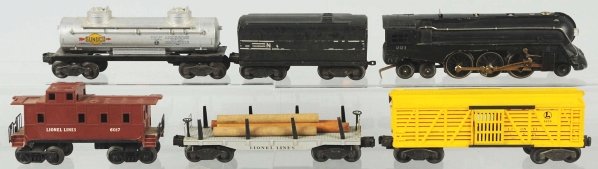 Lionel O-27 Gauge No. 221 Freight Train Set.: American. Includes no. 221 engine with matching no. 221W whistle tender, and four freight cars consisting of one cattle car, one tank car, one lumber car, and one caboose. Various conditions with some
