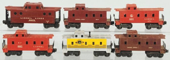 Lot of 6: Lionel Cabooses.: American. Post-war. Includes one Rio Grande, one porthole caboose and four others. Various conditions. Condition (Very Good).