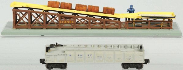 Lot of 2: Lionel Train Cars.: American. Post-war. Includes no. 362 barrel loader and no. 3563 operating barrel car. Also comes with original barrels in small box and barrel cars also have their boxes. Boxes with some staining and
