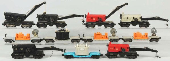 Lot of 10: Lionel Train Cars.: American. Post-war. Includes searchlight cars, transition cars, and crane cars. Includes an original box for no. 3520. Condition (Very Good).