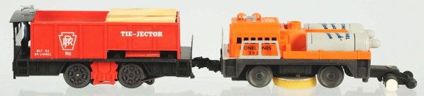 Lot of 2: Lionel O-27 Gauge Power Units.: American. Post-war. Includes no. 3927 track cleaning car with original tanks and no. 55 Tie-Jector car with original wooden pieces. Very little wear overall. Includes both original boxes. Condition (E