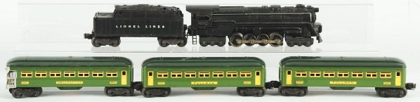 Lionel O-27 Gauge No. 2020 Passenger Train Set.: American. Pre-war. Includes no. 2020 steam-type engine with matching Lionel Lines no. 2466 whistle tender and three passenger cars. Some scratching to roofs of cars. Condition (Very Good).