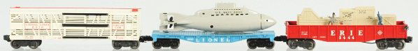 Lot of 3: Lionel O-27 Gauge Freight Cars.: American. Post-war. Includes no. 6376 circus car, no. 3444 Erie Hobo car, and no. 3830 US Submarine car. Includes two original boxes. Condition (Very Good - Excellent).