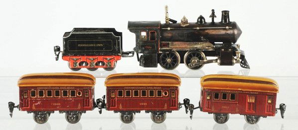 Marklin O-Gauge Passenger Train Set.: German. Includes no. 4000 live steam engine that has been fired and has some burning and wear. Also includes one matching Pennsylvania Lines tender and three passenger cars. Passenger cars consist of