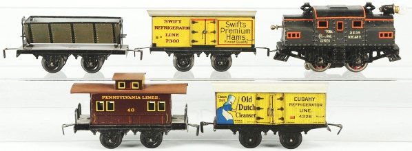 Bing O-Gauge Freight Train Set.: German. Includes no. 3238 electric style cast loco with dump car, Swift Premium Ham car, Old Dutch Cleanser car, and Pennsylvania Railroad caboose. Engine has very little wear and one spot of wear nea