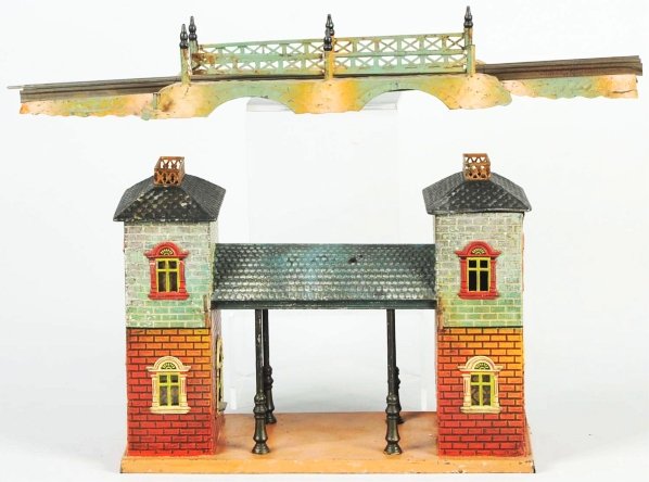 Lot of 2: Tin Bing Train Station & Bridge Pieces.: German. Combination of hand-painting and lithography. Station has some litho loss to upper sections and some paint loss and scratching around edges of base. The bridge comes with track and has very li