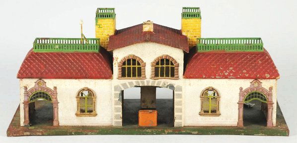 Tin Litho Bing Train Station.: German. 1-gauge. Large station. Bing emblem in front. Missing top lead eagle pieces and base has some pitting and wear throughout. Also, someone has repainted the top roof. Condition (Good - Very Good