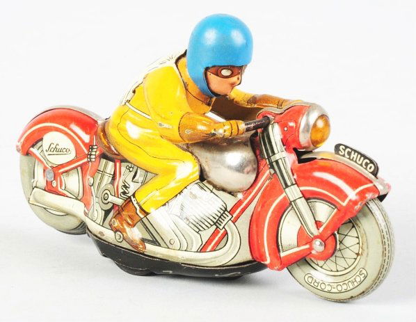 Tin Litho Schuco Motorcycle Wind-Up Toy.: German. Working. Marked "Made in US Zone Germany" on bottom, "2" on back, and "Schuco" on the bike. Comes with rider. Some scratching and wear overall. Condition (Very Good - Excellent). Size 5" L.